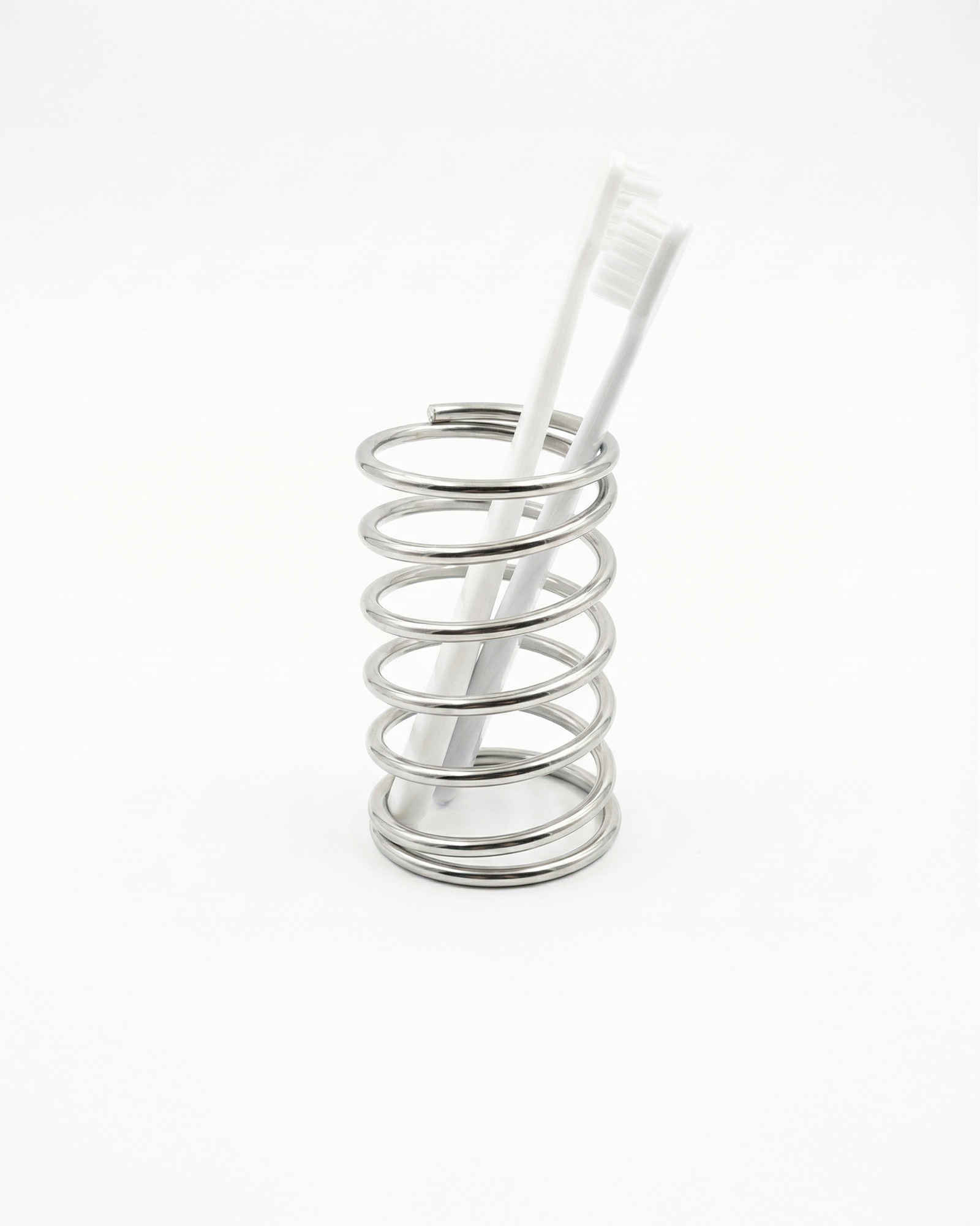 the spring coil stand | toothbrush holder
