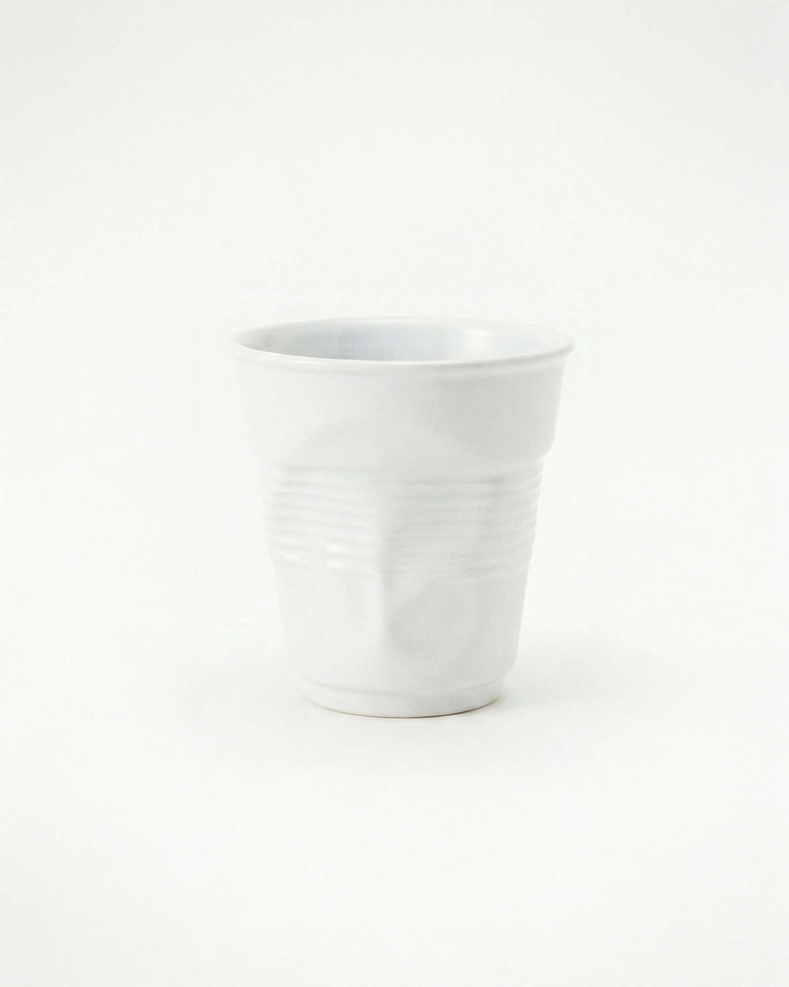 the crushed cup | irregular shape ceramic cup | white