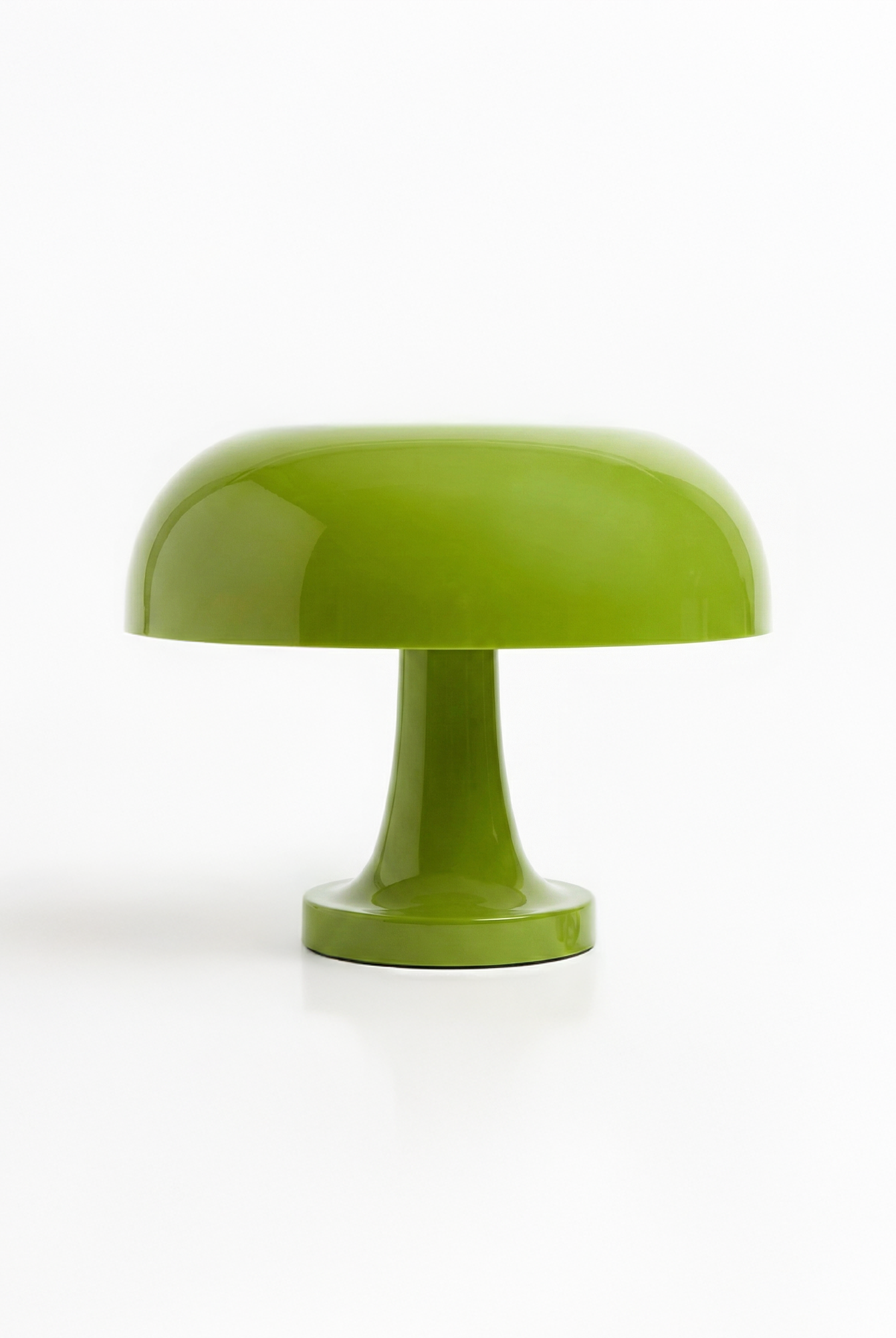 Green mushroom-shaped object on a white background