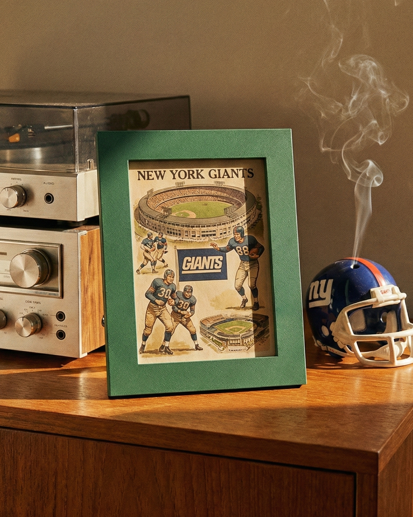 New York Giants framed picture and helmet on a wooden surface with a vintage radio and smoke.