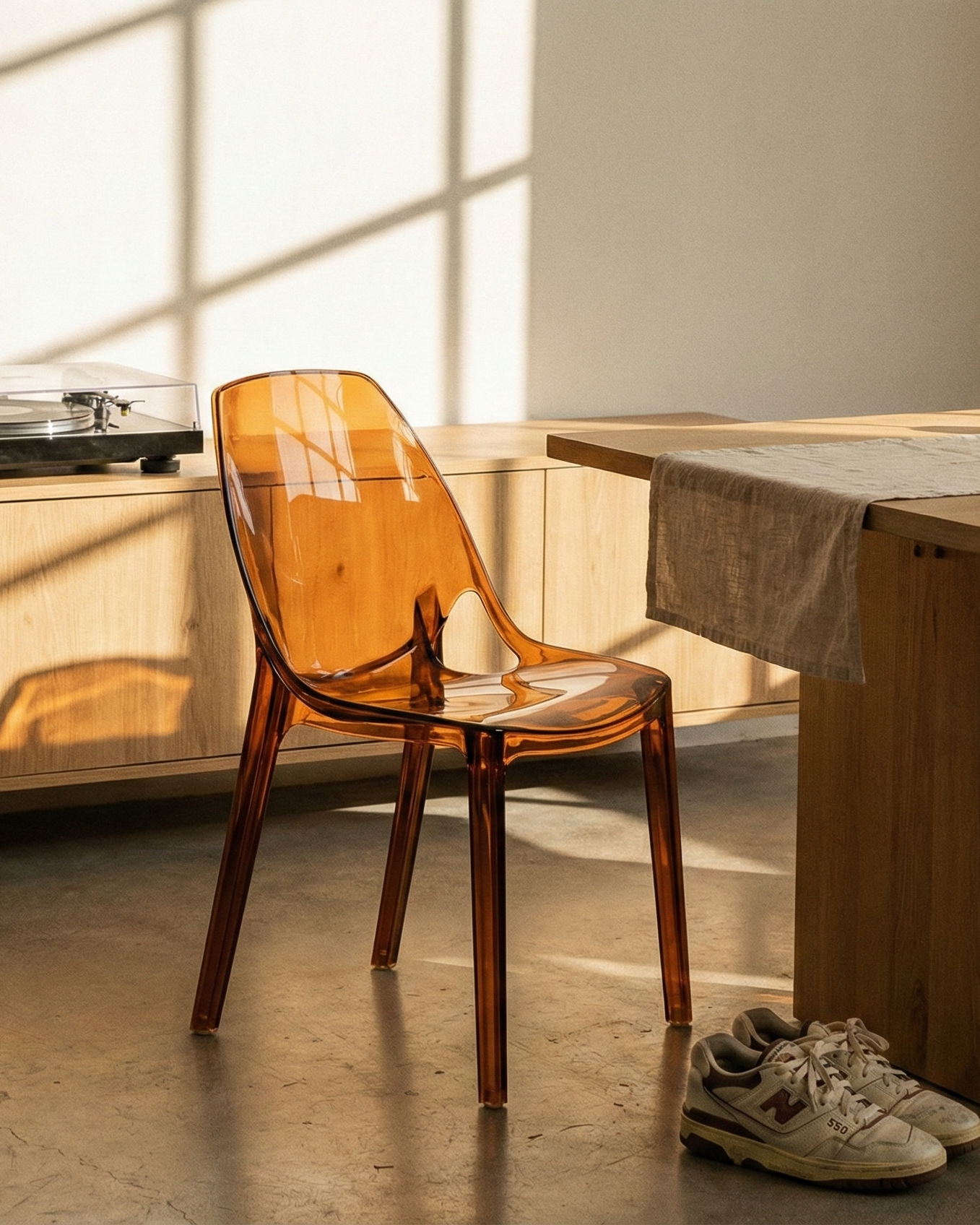 the prism perch | transparent dining chair | brown