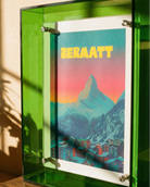 Framed poster of Zermatt with a mountain landscape and colorful sky.